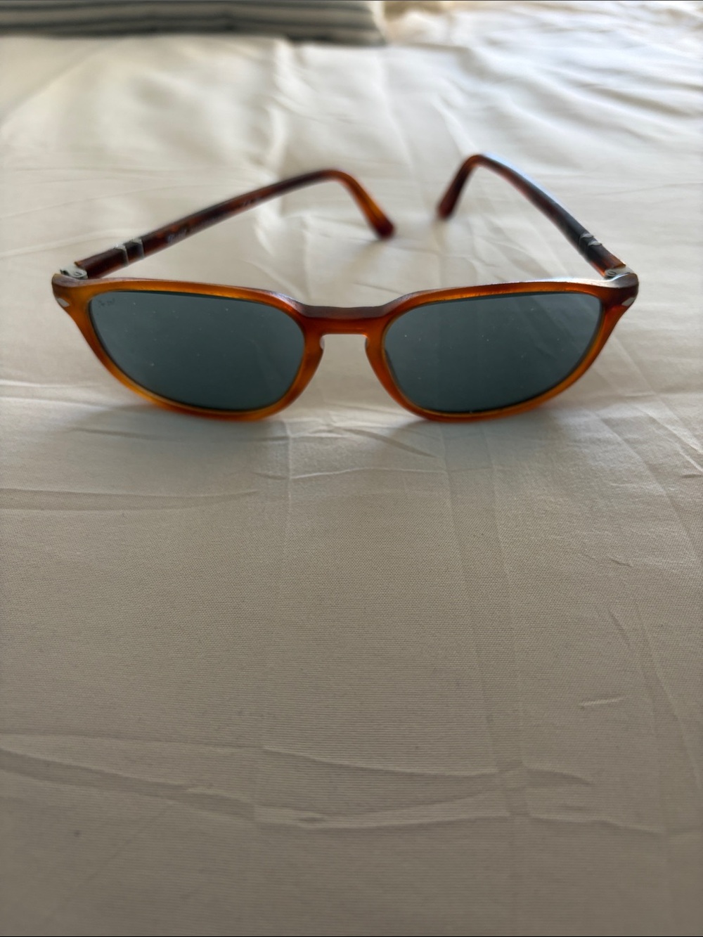 Persol Amber/Tortoise Frame Sunglasses with Dark Lenses